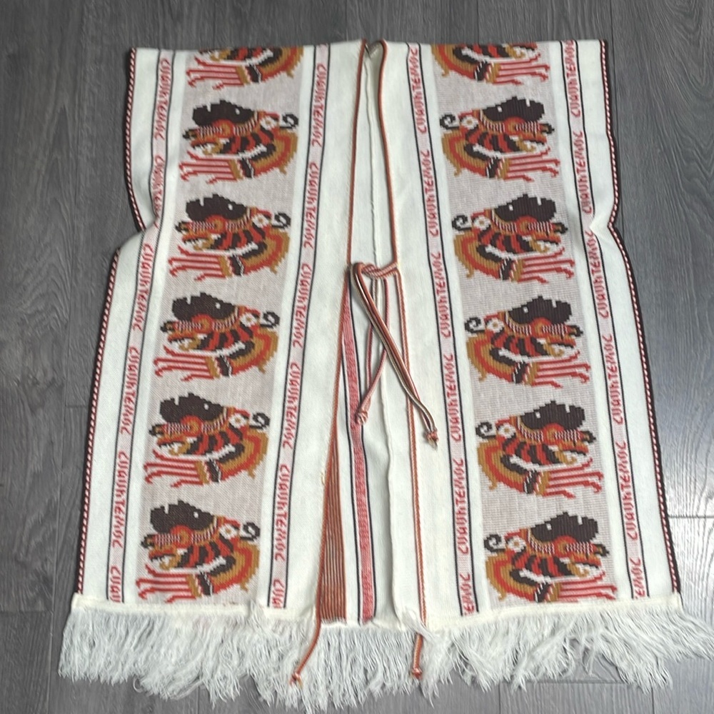 Cuauhtemoc fringe centre tie poncho cape knitted Mexican